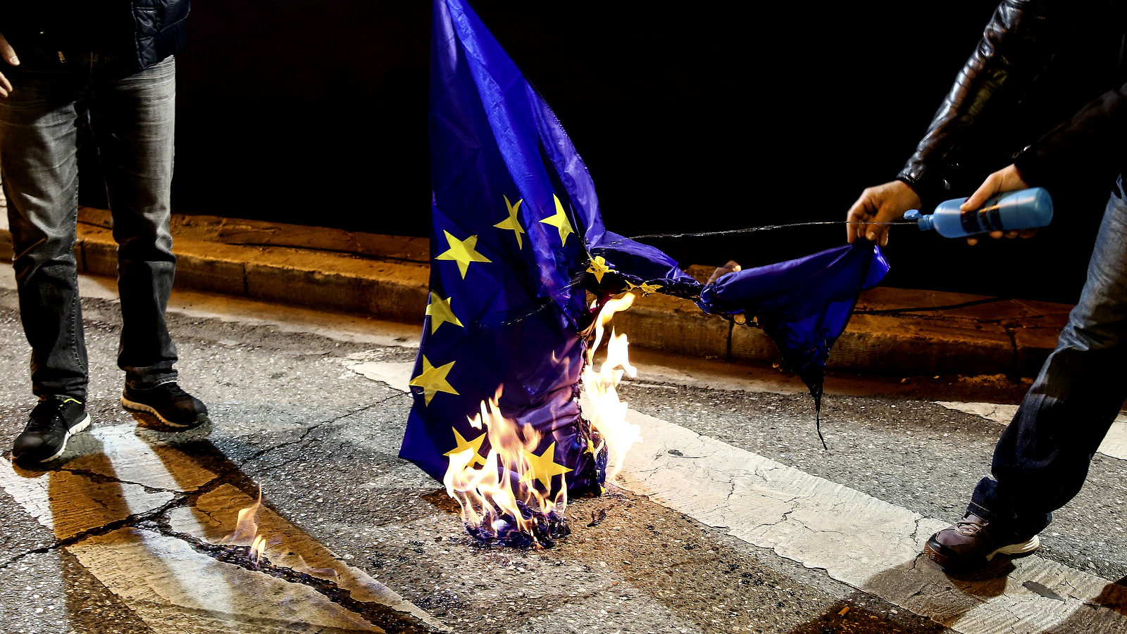 PAME burn a EU flag