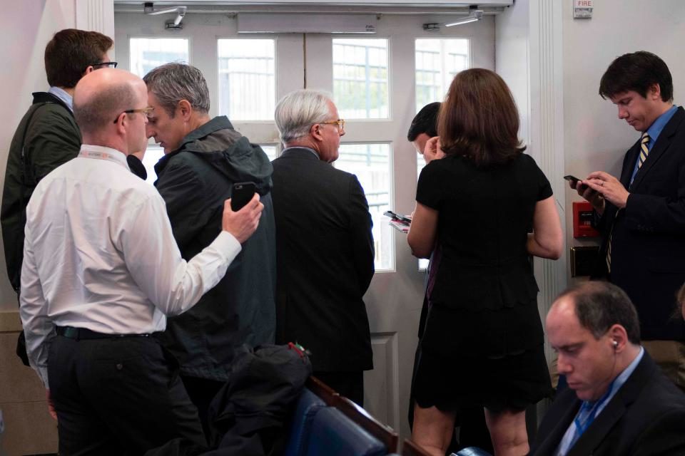 Click to enlarge Members of the White House