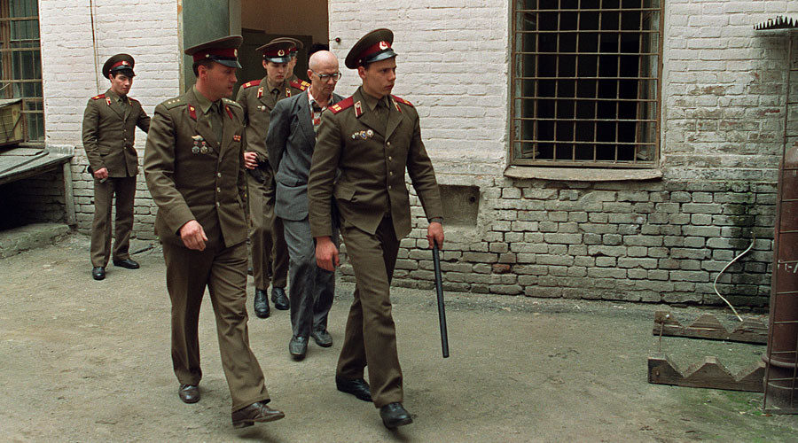 Click to enlarge Chikatilo is led to the courtroom