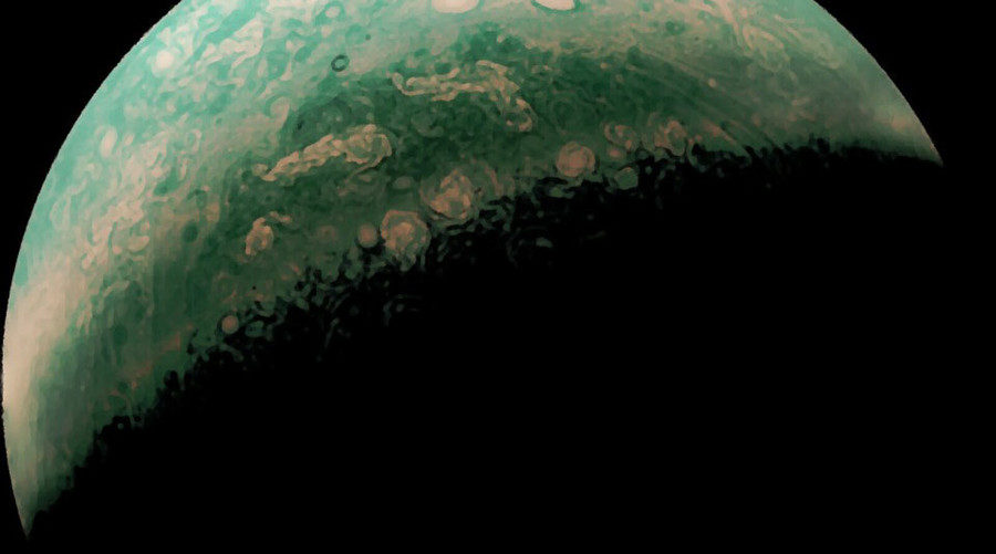 Click to enlarge green tinged jupiter juno probe