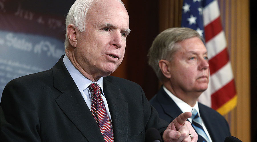 US Senator John McCain (L) and Senator Lindsey Graham (R)