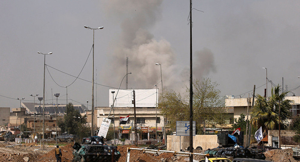 Smoke rises from the old city during a battle against Islamic State militants, in Mosul, Iraq, March 29, 2017