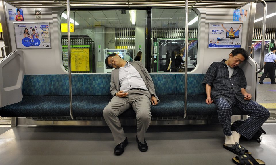 Click to enlarge sleeping on a train