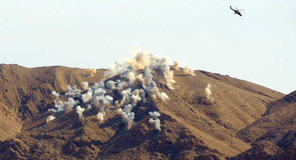 Russian helicopters Mi-24p airstrake the terrorists' positions 20 km outside Palmyra
