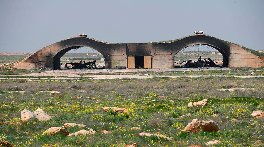 The wreckage of destroyed planes on Shayrat air base in Syria