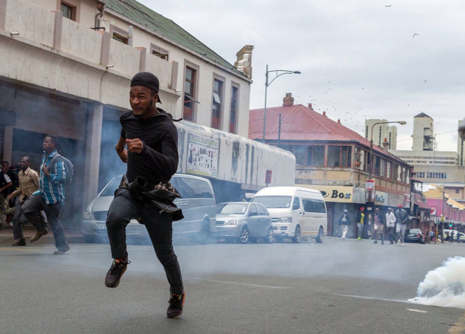 Click to enlarge Fleeing ANC Youth league protester
