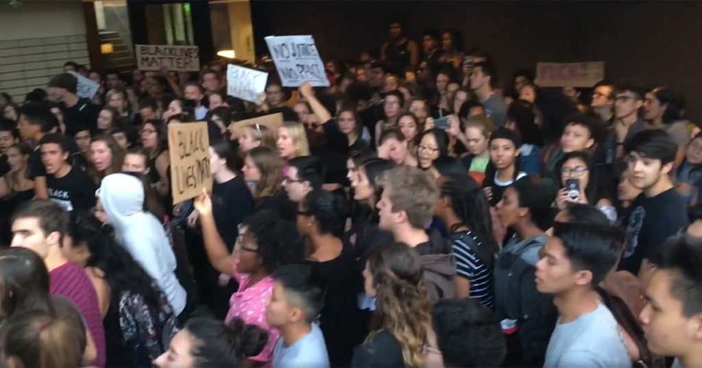 Click to enlarge Protesters