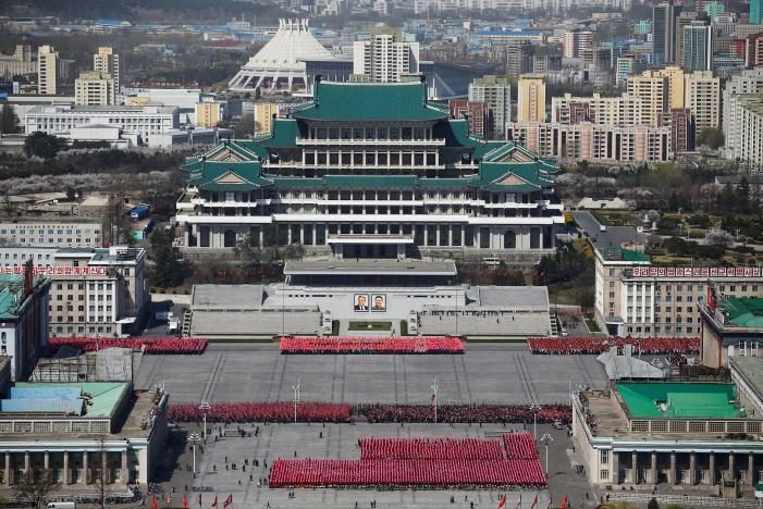 People practice for the expected parade on the main Kim Il Sung square in central Pyongyang