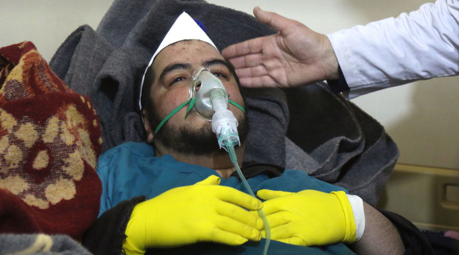 A Syrian man receives hospital treatment in Maaret al-Noman