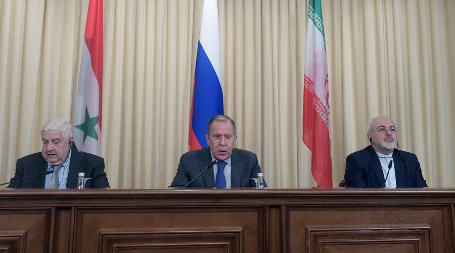 Click to enlarge Foreign Ministers, Sergei Lavrov (C) of Russia, Walid al-Muallem (L) of Syria and Mohammad Javad Zarif of Iran attend a news conference in Moscow