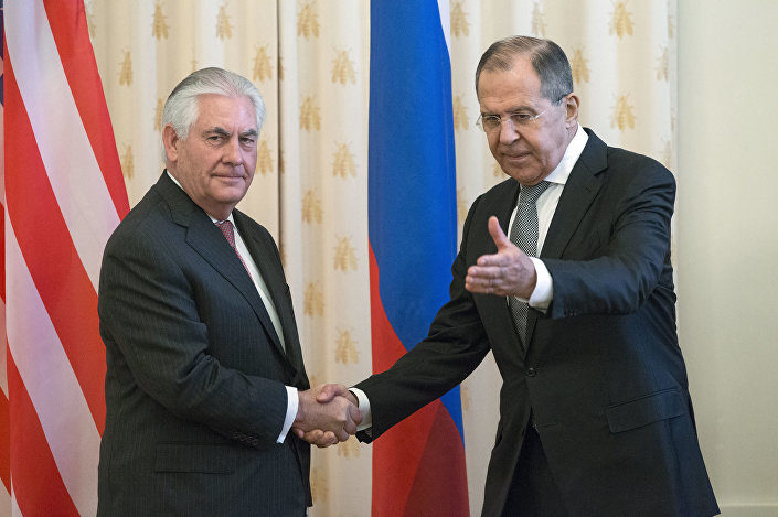 Click to enlarge US Secretary of State Rex Tillerson and Russian Foreign Minister Sergey Lavrov, shakes hands prior to their talks in Moscow