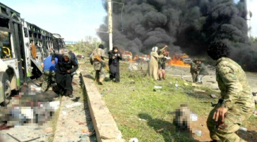 Click to enlarge Still image shows bodies lying near burnt out buses in what is said to be Aleppo's outskirts, Syria April 15, 2017