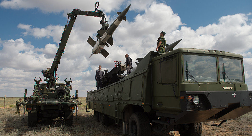 Servicemen load a Pechora-2M air defense complex of the Tajikistan armed forces