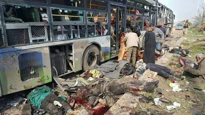 Click to enlarge Still image shows bodies lying near burnt out buses in what is said to be Aleppo's outskirts