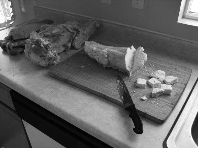 Click to enlarge Cutting up the suet.