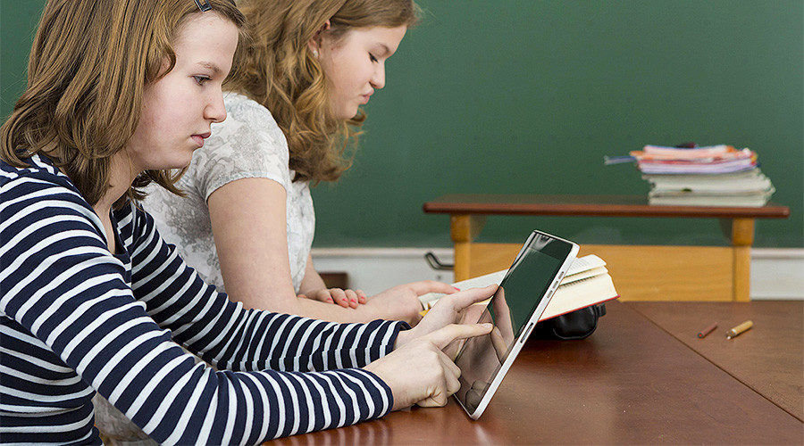 child student on ipad