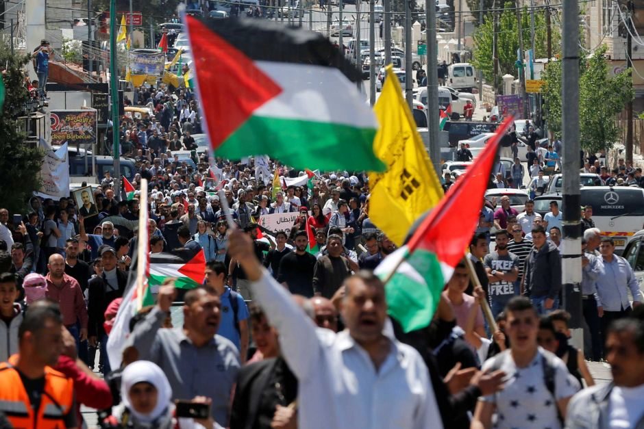 Click to enlarge Palestinians take part in a prisoner solidarity rally in the West Bank town of Bethlehem