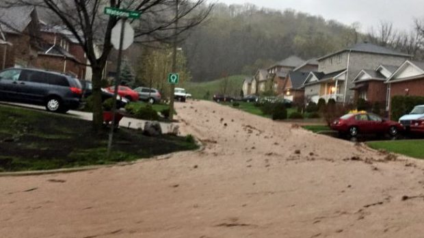 Click to enlarge Dundas, Ont. has been hit by flash flooding along the Niagara escarpment due to heavy rains.