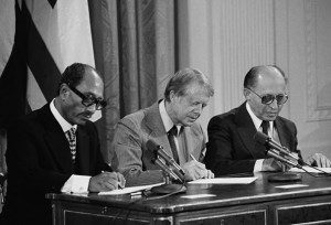 President Jimmy Carter signing the Camp David peace agreement with Egypt’s Anwar Sadat and Israel’s Menachem Begin