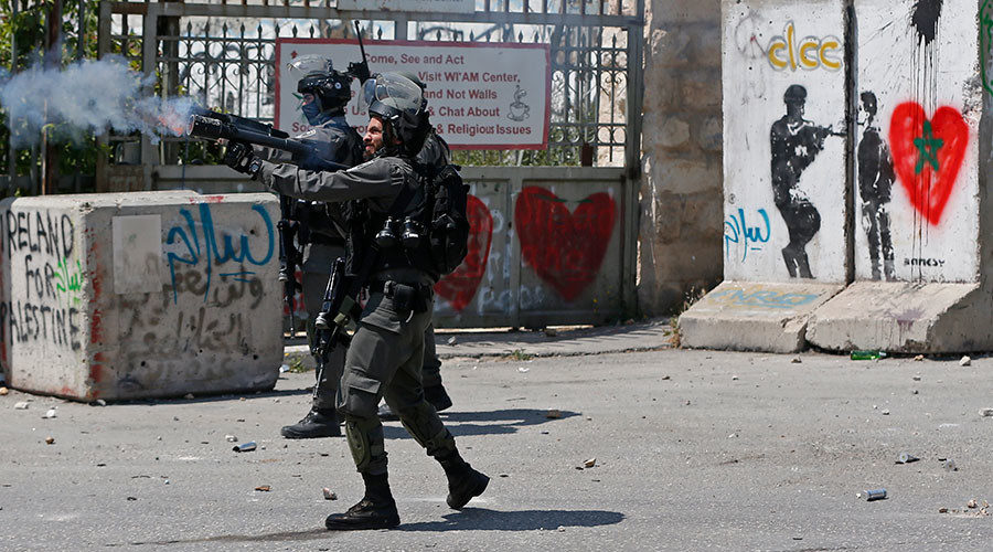 Israeli security forces fire tear gas towards Palestinian protesters