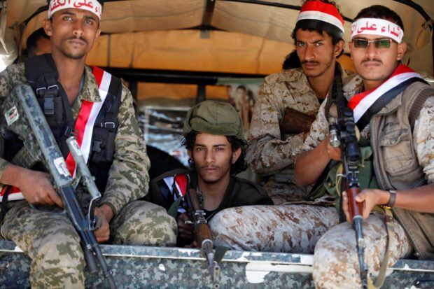 Click to enlarge Houthi fighters in Yemen
