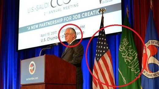 Click to enlarge rex tillerson with us and saudi flags