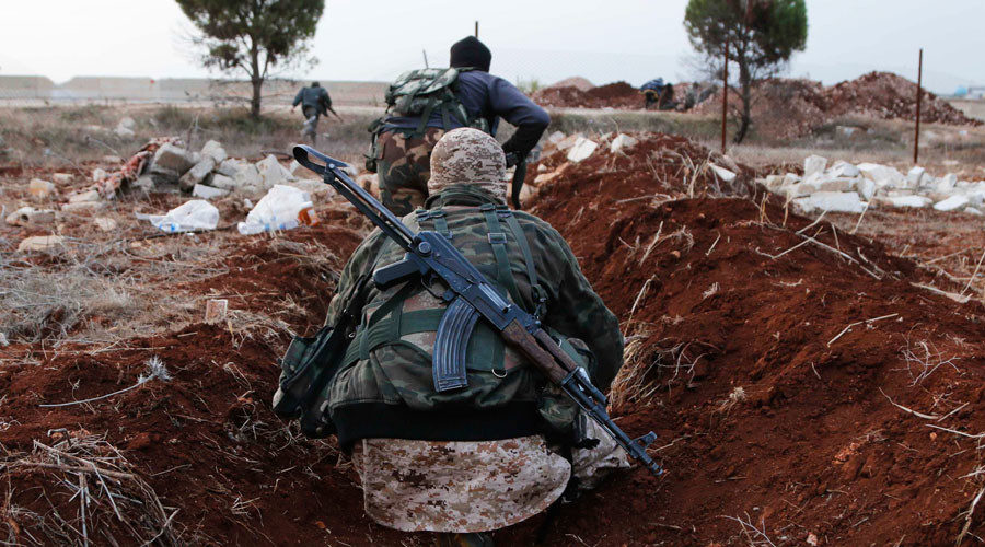 Click to enlarge Members of al Qaeda's Nusra Front carry their weapons