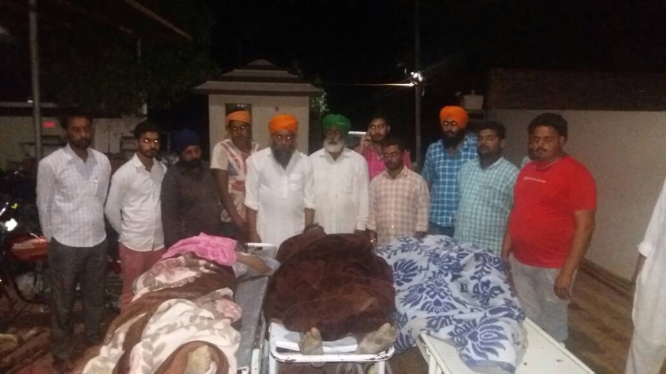 The deceased being taken outside the hospital