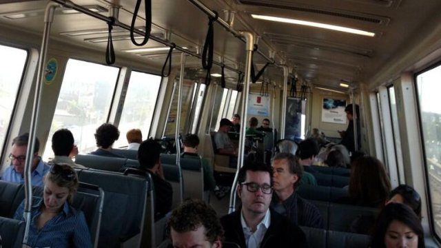 Passengers aboard BART train