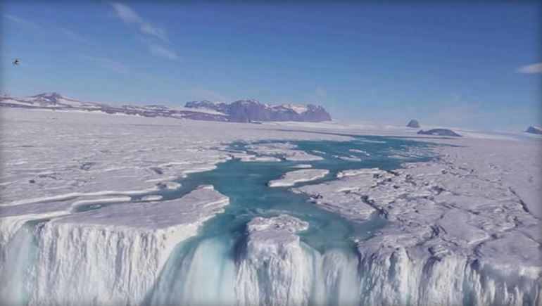 Click to enlarge Nansen Ice Shelf waterfall