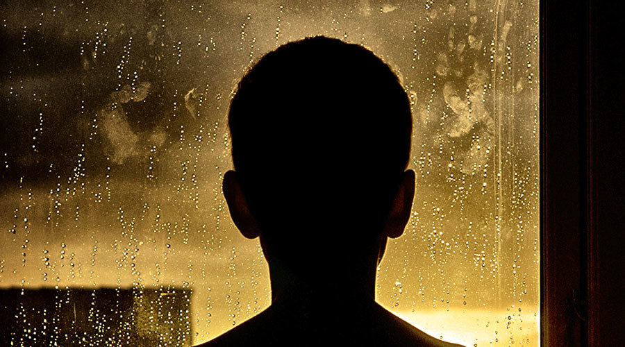 boy in window