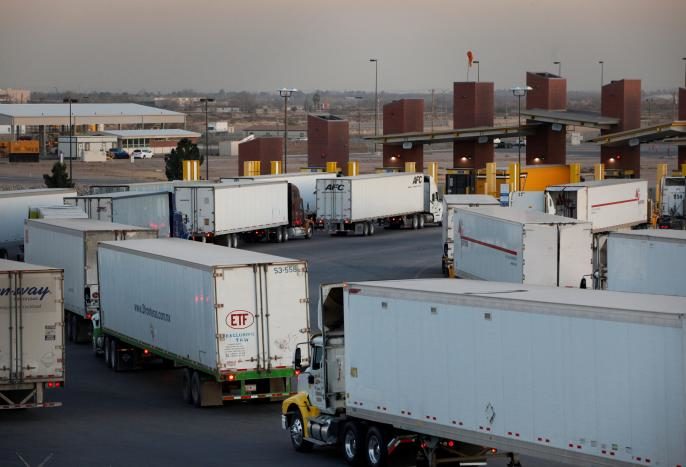 Trucks wait at the international border bridge Zaragoza
