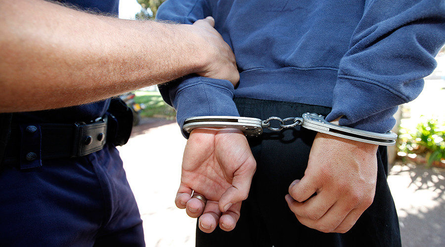 police handcuffed man