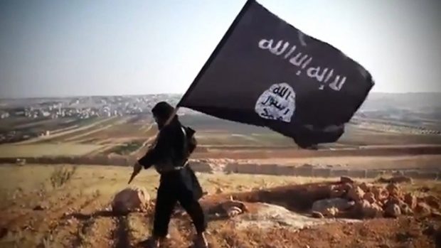 ISIS soldier and flag
