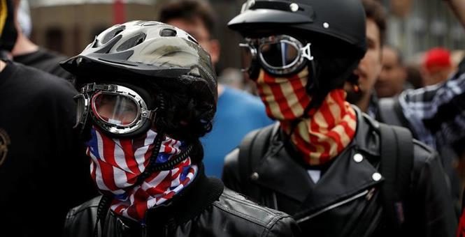 Click to enlarge masked demonstrators