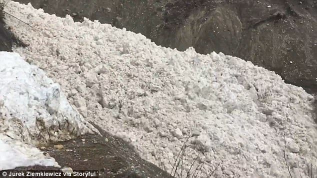 Click to enlarge The group were visiting the Rocky Mountains in British Columbia, Canada, on April 21 when they saw the avalanche