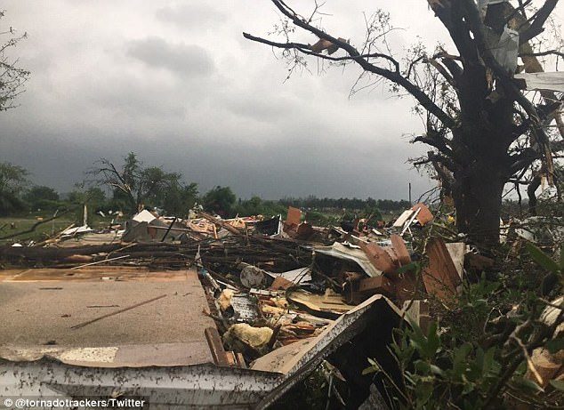 Pictured is some of the carnage from the tornado that touched down in East Texas