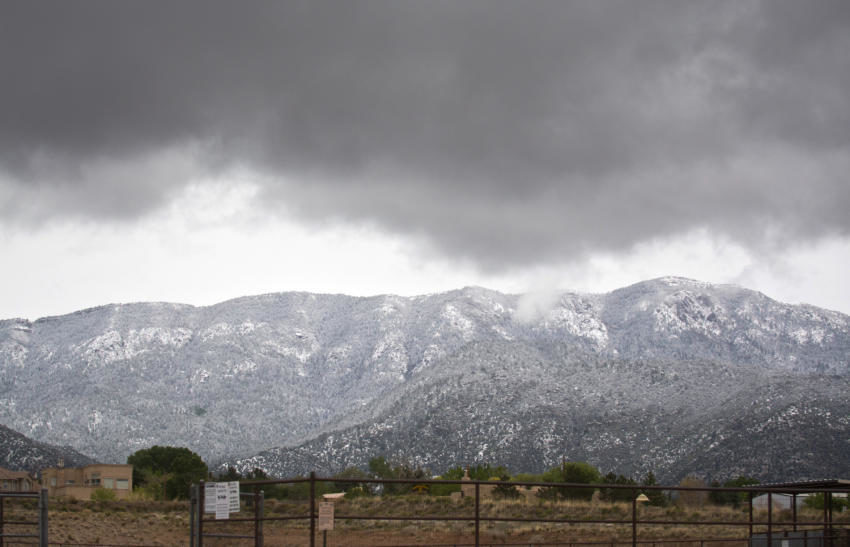 Click to enlarge Snow covers the Sandias on Saturday