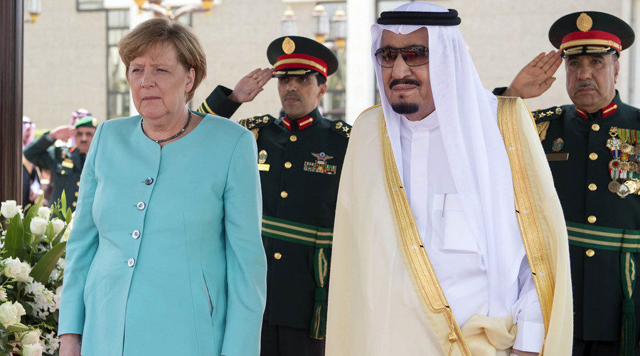 Click to enlarge German Chancellor Angela Merkel (L) standing next to Saudi Arabia's King Salman bin Abdulaziz al-Saud.