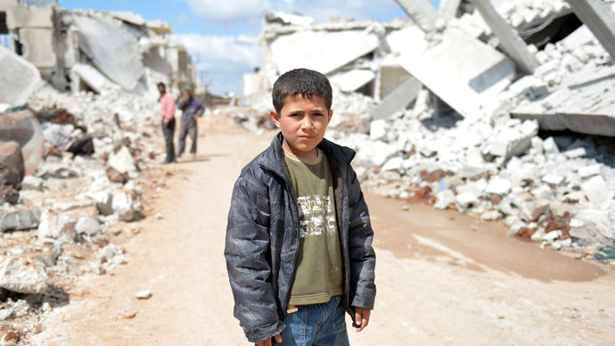 Syria boy destroyed houses