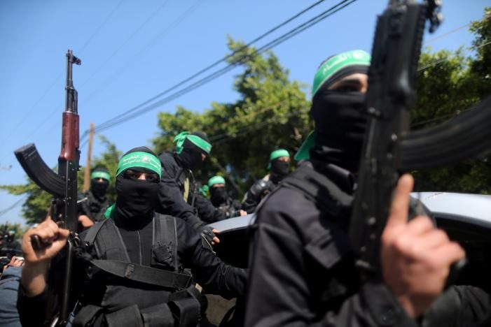 Click to enlarge Palestinian members of Hamas