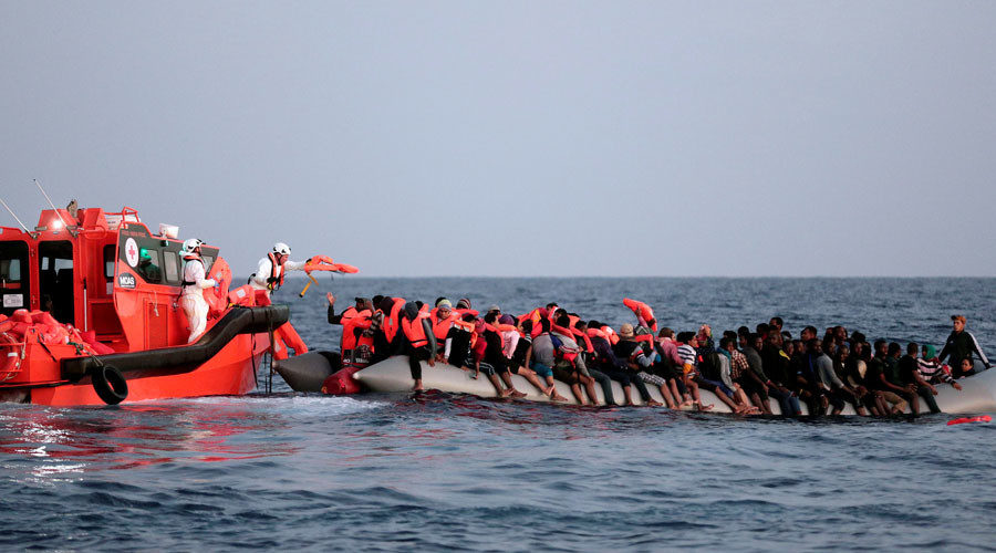 Migrants being rescued by Italian Red Cross