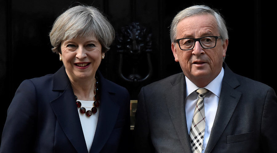 Click to enlarge Theresa May and Jean-Claude Juncker