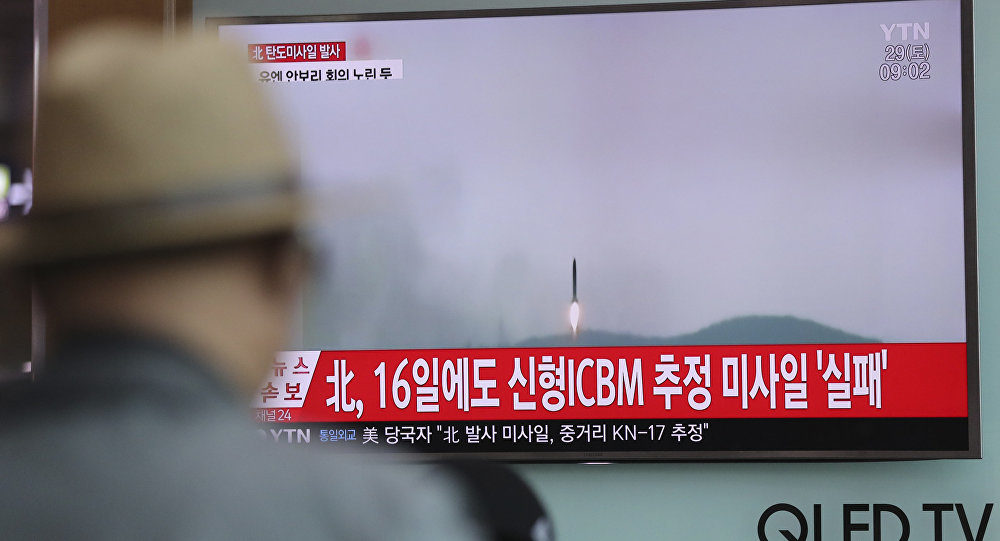 TV screen showing N. Korea missile launch