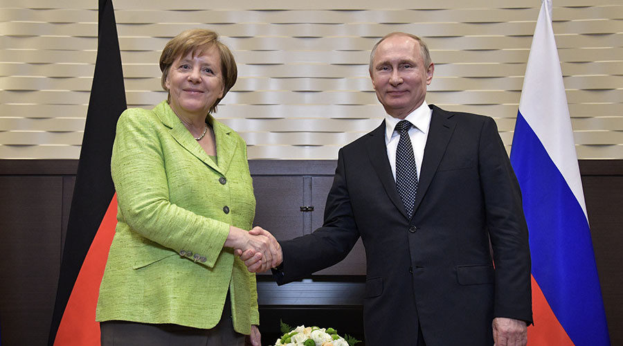 Putin Merkel