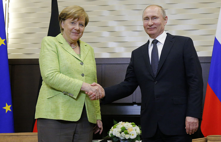 German Chancellor Angela Merkel and Russian President Vladimir Putin