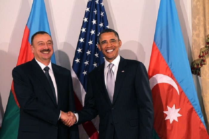 Obama greeting the hereditary dictator of Azerbaijan, Ilham Aliyev
