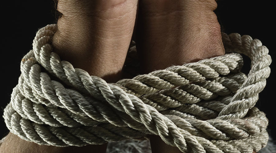 Hands tied rope