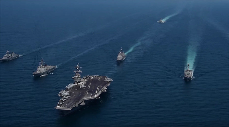 USS Carl Vinson being escorted