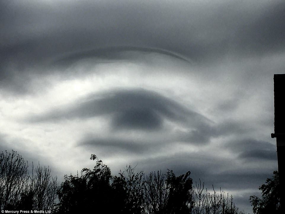 Click to enlarge Father-of-two Graham Telford, 46, spotted the unusual meteorological sighting looming over Leeds, Yorkshire